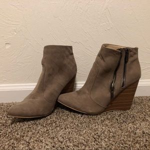 Wedge heel booties with zipper details